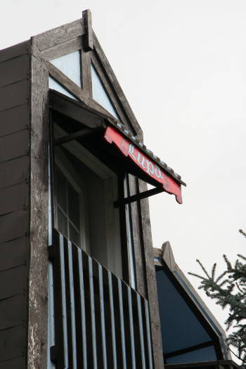 Built of wood according to time-honoured regional practice